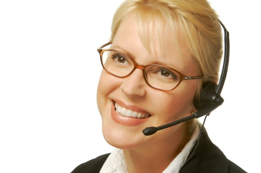 A beautiful friendly secretarytelephone operator. photo