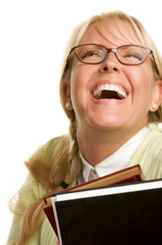 Attractive Student Carrying Her Books photo
