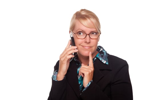 Intrigued Blonde Woman Using Phone photo