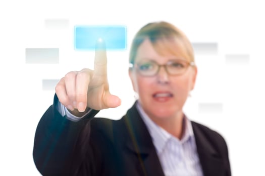 Woman Pushing an Interactive Touch Screen Button photo