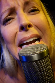 Woman Sings with Passion photo