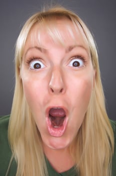 Shocked Blond Woman with Funny Face photo