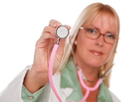 Attractive Female Doctor Holding Stethoscope photo