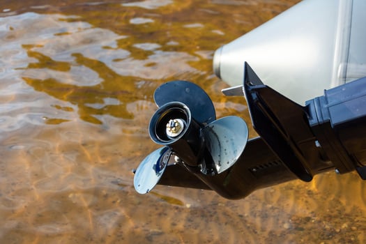 Fishing Boat Outboard Motor Propeller, Outboard Motor on a Pleasure boat, lake, river photo