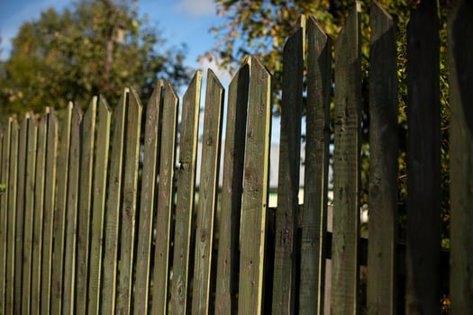 Fence made of wood. Village fence. Thing made of wood. photo
