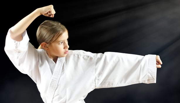 Teenage Girl punching Air Attack Fight Movement photo