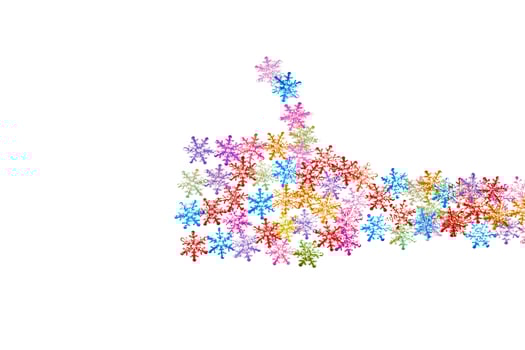 Thumbs up like gesture from colorful snowflakes, isolated white background photo