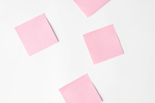 Mockup stickers set on white background. Blank pasted stickers on white wall photo