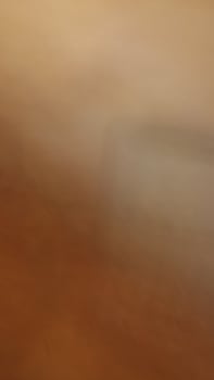 Art blur and speed of light Orange, yellow, gray and black, light and color like fog and smoke. photo