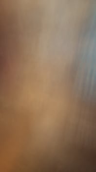 Art blur and speed of light Orange, yellow, gray and black, light and color like fog and smoke. photo