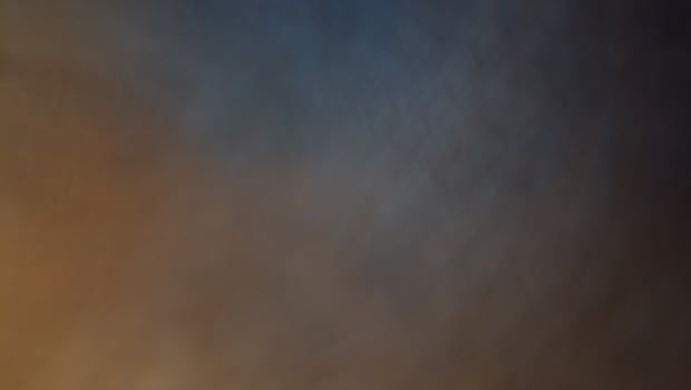 Art blur and speed of light Orange, yellow, gray and black, light and color like fog and smoke. photo