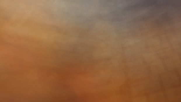 Art blur and speed of light Orange, yellow, gray and black, light and color like fog and smoke. photo