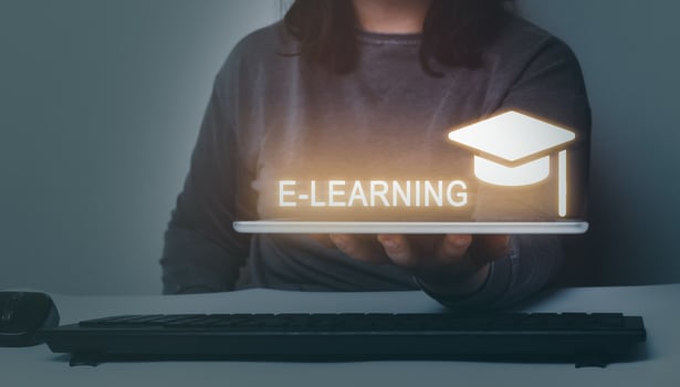 Woman showing E-learning digital interface on tablet. Webinar online. Education on internet. photo