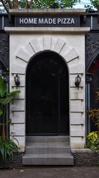 An entrance and sign says home made pizza. photo