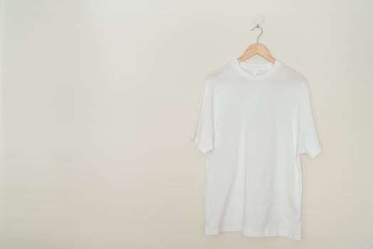 t-shirt hanging with wood hanger photo