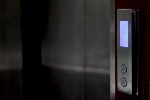Photo background of the elevator showing on the first floor