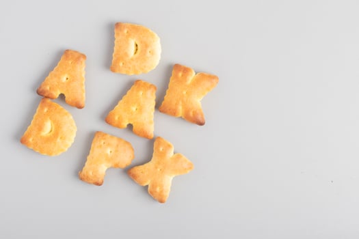 English letter bread snack on gray background photo
