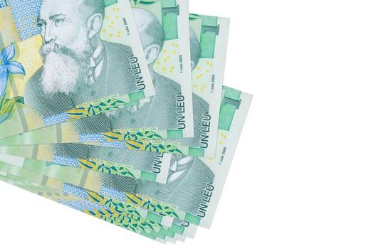 1 Romanian leu bills lies in small bunch or pack isolated on white. Mockup with copy space. Business and currency exchange photo