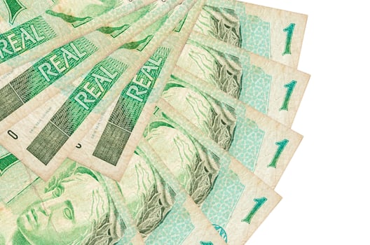 1 Brazilian real bills lies isolated on white background with copy space stacked in fan shape close up photo