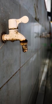 Close up view of water faucet. photo