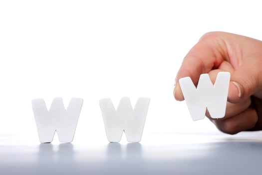 Hand with WWW letter block photo