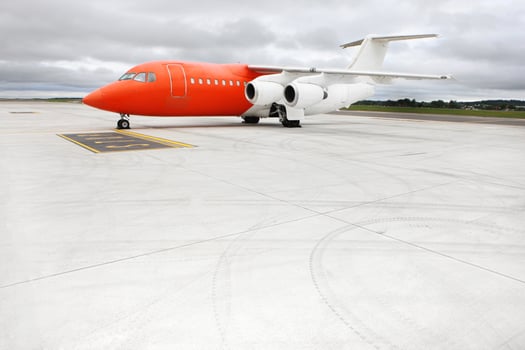 Orange business jet photo