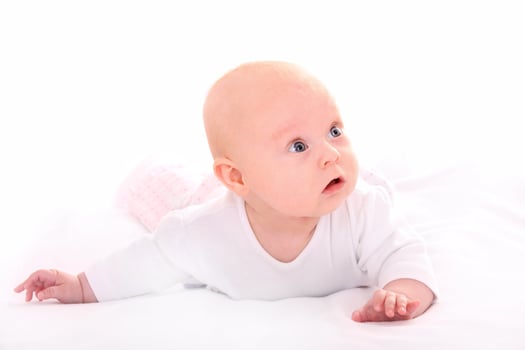Curious baby on white background photo