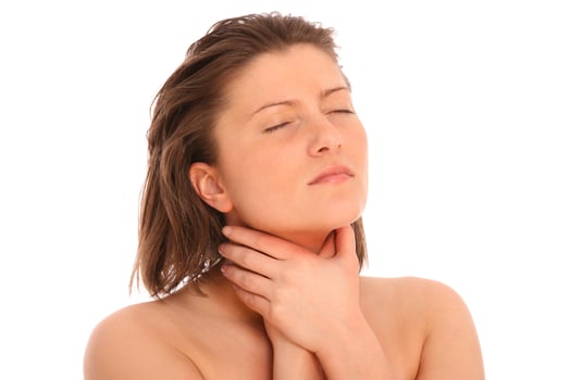 Woman with throat pain photo