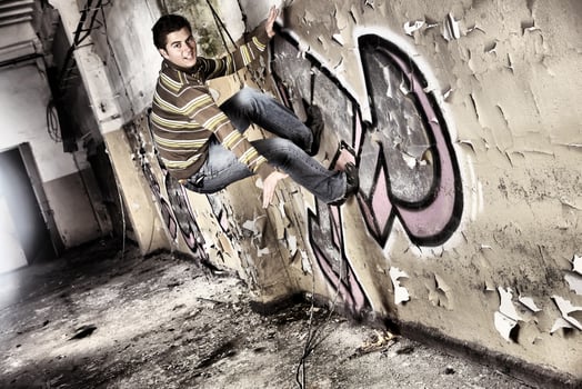 Man jumping on the wall photo