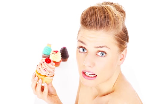 Woman and cupcakes photo