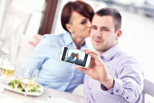 Kiss in a restaurant photo