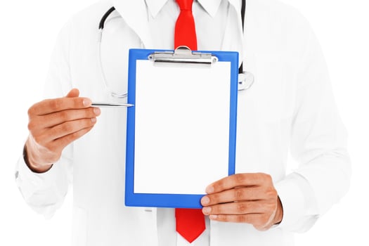 Midsection of a doctor holding folder photo