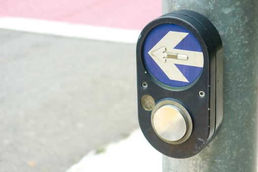close up of crossing signal button in singapore photo