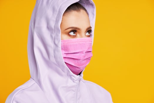 Young nice woman isolated over yellow background photo
