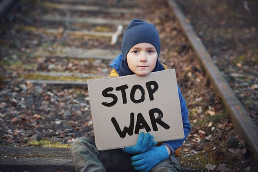 Picture of a child with a lot of love and peaceful message photo