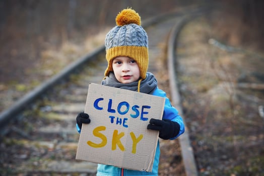 Picture of a child with a lot of love and peaceful message photo