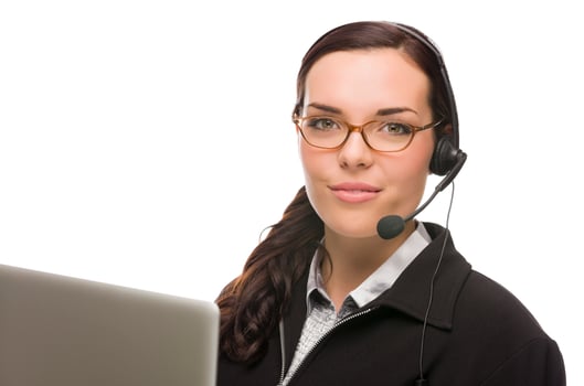 Mixed Race Receptionist In Front of Computer Wearing Phone Head-set photo