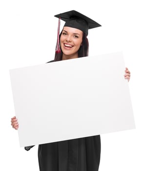 Female Graduate in Cap and Gown Holding Blank Sign photo