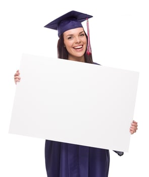 Female Graduate in Cap and Gown Holding Blank Sign photo
