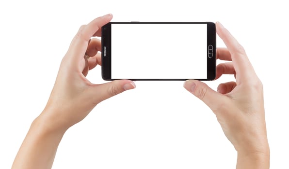 Female Hands Holding Smart Phone with Blank Screen on White photo