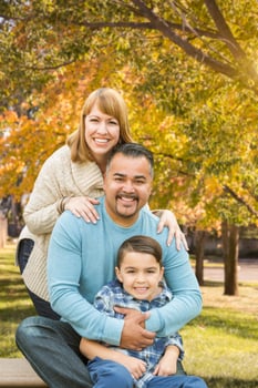 Mixed Race Hispanic and Caucasian Family Portrait at the Park photo