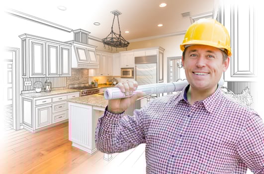 Contractor in Hard Hat Over Custom Kitchen Drawing and Photo