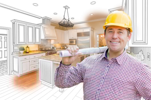 Contractor in Hard Hat Over Custom Kitchen Drawing and Photo