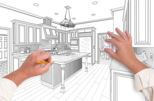 Male Hands Sketching Beautiful Custom Kitchen photo