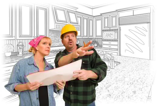 Contractor Talking with Customer Over Kitchen Drawing photo