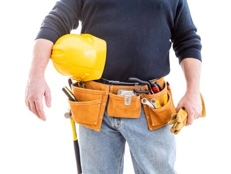 Contractor With Tool Belt, Hard Hat and Gloves Isolated on White Background photo