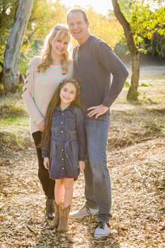 Caucasian Grandmother and Grandfather With Young Mixed Race Grandaughter Outdoors photo