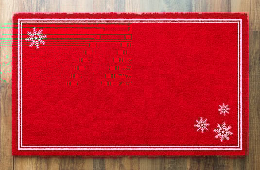 Blank Holiday Red Welcome Mat With Snow Flakes On Wood Floor Background photo