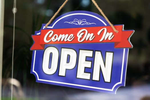 Storefront Open Sign Through Window photo