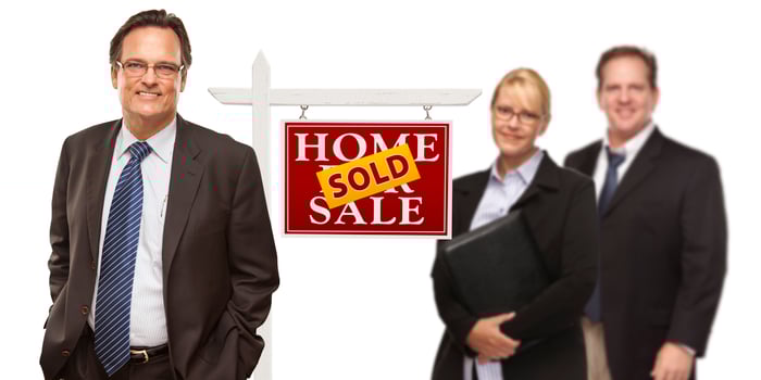 Men and Woman with Real Estate Sign Isolated photo